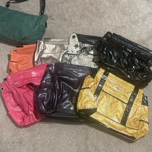 Variety of MICHE shells, purse, purse organizer, and an extra strap.